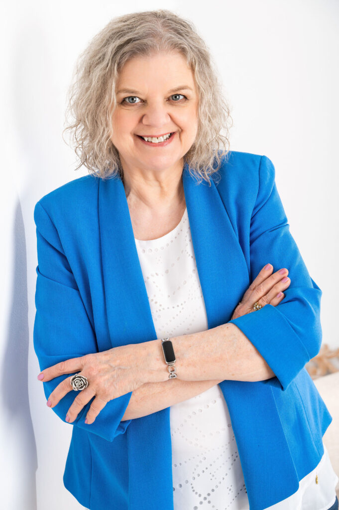 A photograph of frances paquette president and founder of mentor coaching.